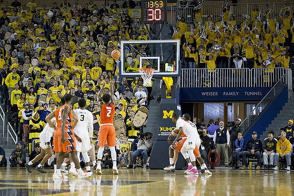 Zavier Simpson (3), Muhammad-Ali Abdur-Rahkman (12), and Duncan Robinson (22)