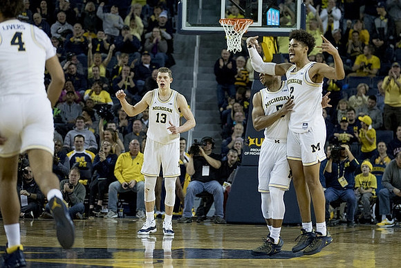 Isaiah Livers (4), Moritz Wagner (13), Jaaron Simmons (5), and Jordan Poole (2)