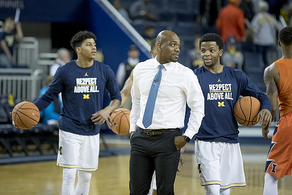Eli Brooks (55), Deandre Haynes, and Zavier Simpson (3)