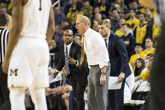 John Beilein, Deandre Haynes, and Luke Yaklich
