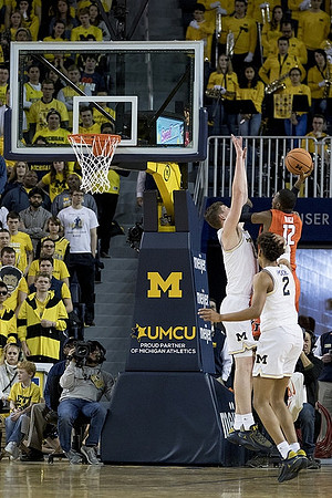 Moritz Wagner (13) and Jordan Poole (2)