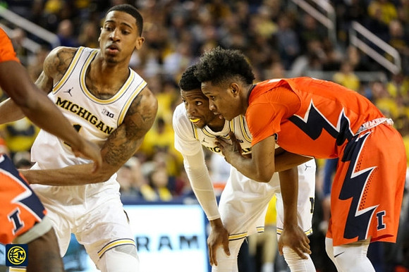 Charles Matthews (1) and Zavier Simpson (3)