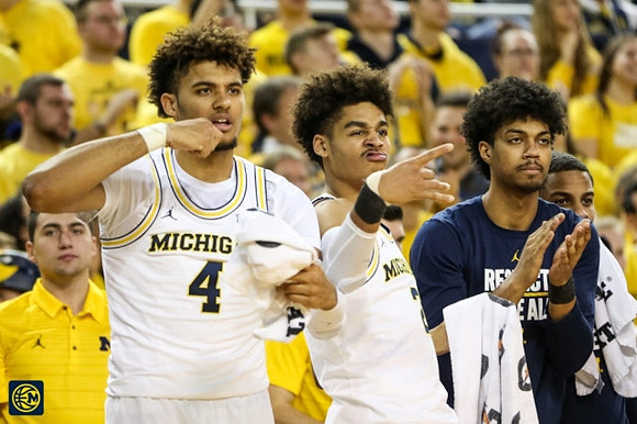 Isaiah Livers (4), Jordan Poole (2), and Ibi Watson (23)