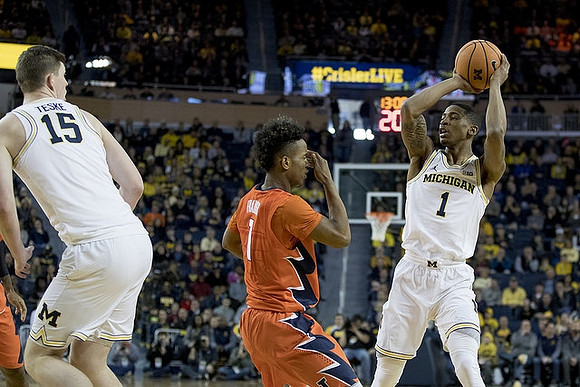 Jon Teske (15) and Charles Matthews (1)