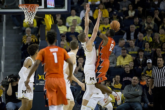 Jordan Poole (2), Duncan Robinson (22), and Moritz Wagner (13)