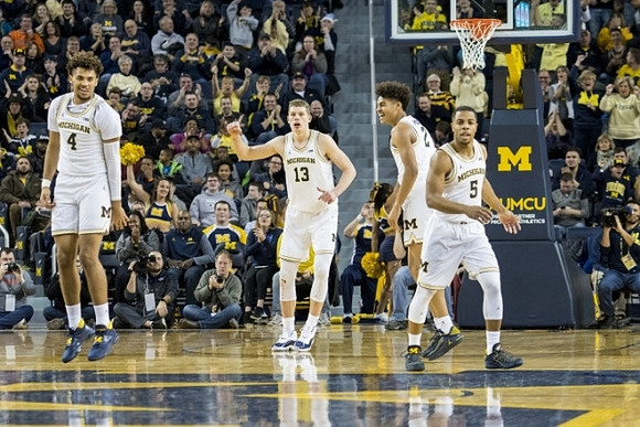 Isaiah Livers (4), Moritz Wagner (13), Jordan Poole (2), and Jaaron Simmons (5)