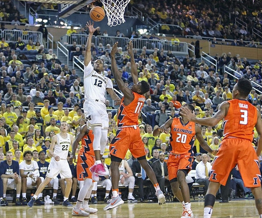 Muhammad-Ali Abdur-Rahkman (12) and Duncan Robinson (22)