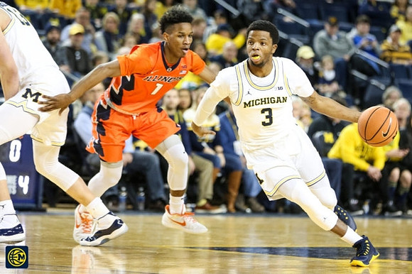 Zavier Simpson (3) and Moritz Wagner (13)