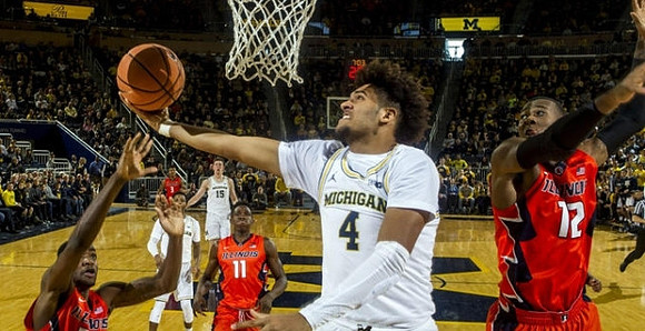 Isaiah Livers (4), Zavier Simpson (3), and Jon Teske (15)