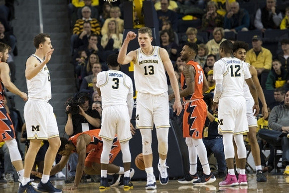 Duncan Robinson (22), Zavier Simpson (3), Moritz Wagner (13), Muhammad-Ali Abdur-Rahkman (12), and Jordan Poole (2)