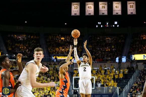 Jon Teske (15) and Jordan Poole (2)