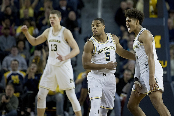 Moritz Wagner (13), Jaaron Simmons (5), and Jordan Poole (2)