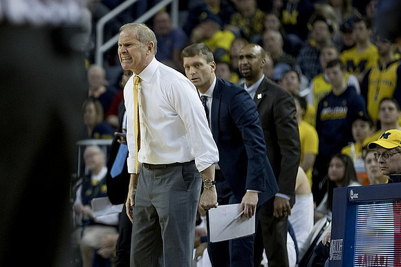 John Beilein, Luke Yaklich, and Deandre Haynes