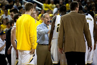Max Bielfeldt (44), Blake McLimans (22), John Beilein, Caris LeVert (23), and Glenn Robinson III (1)