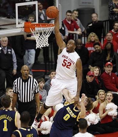 Stu Douglass (1), DeShawn Sims (34), and Zack Novak (0)