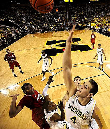 Mitch McGary (4), Glenn Robinson III (1), Caris LeVert (23), and Trey Burke (3)