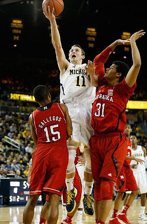 Nik Stauskas (11) and Glenn Robinson III (1)