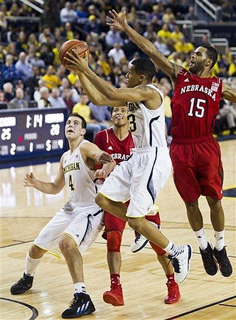 Mitch McGary (4) and Trey Burke (3)