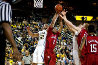 Jordan Morgan (52) and Mitch McGary (4)