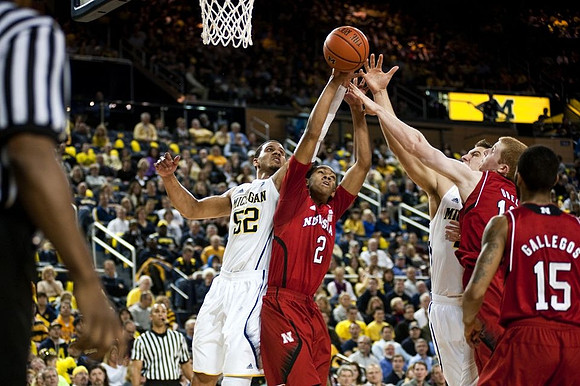 Jordan Morgan (52) and Mitch McGary (4)