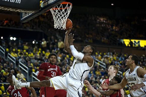 Glenn Robinson III (1) and Jordan Morgan (52)