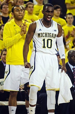 Tim Hardaway Jr. (10) and Jon Horford (15)