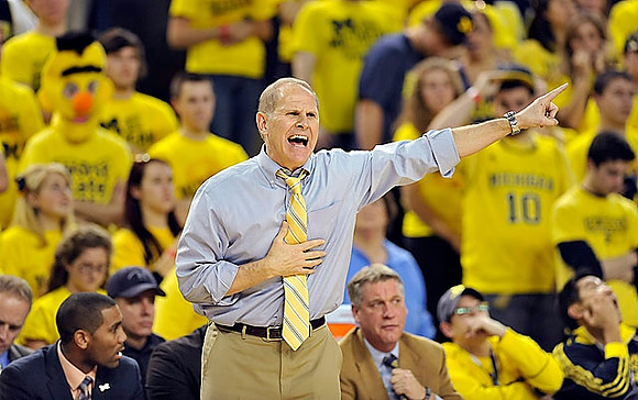LaVall Jordan, John Beilein, and Jeff Meyer