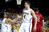 Trey Burke (3), Caris LeVert (23), and Mitch McGary (4)