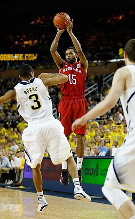 Trey Burke (3) and Nik Stauskas (11)