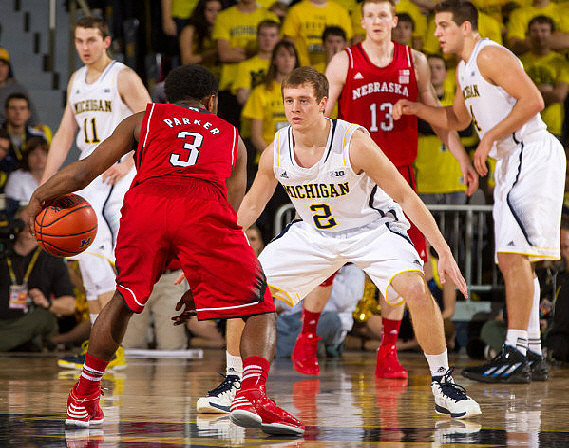 Nik Stauskas (11), Spike Albrecht (2), and Mitch McGary (4)