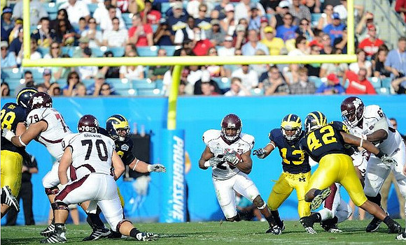 Carvin Johnson (13) and J.B. Fitzgerald (42)