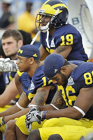 Roy Roundtree (12), Kelvin Grady (19), and Kevin Koger (86)