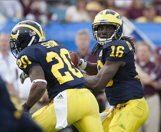 Denard Robinson (16) and Michael Shaw (20)