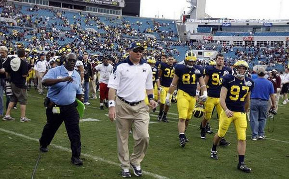 Rich Rodriguez, Zac Johnson (36), Steve Watson (81), and Scott Schrimscher (97)