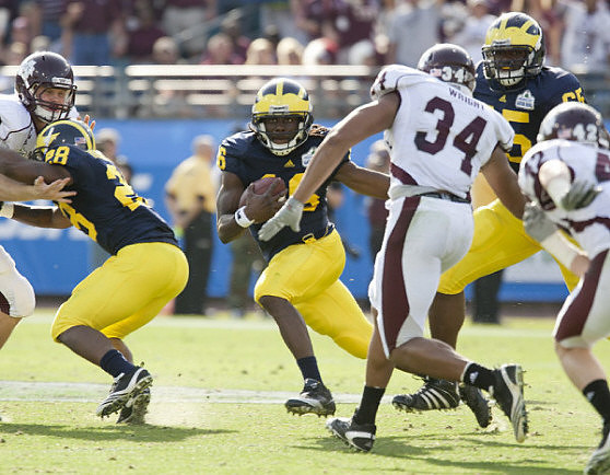Fitzgerald Toussaint (28), Denard Robinson (16), and Patrick Omameh (65)