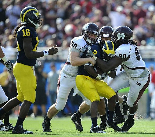 Denard Robinson (16) and Vincent Smith (2)