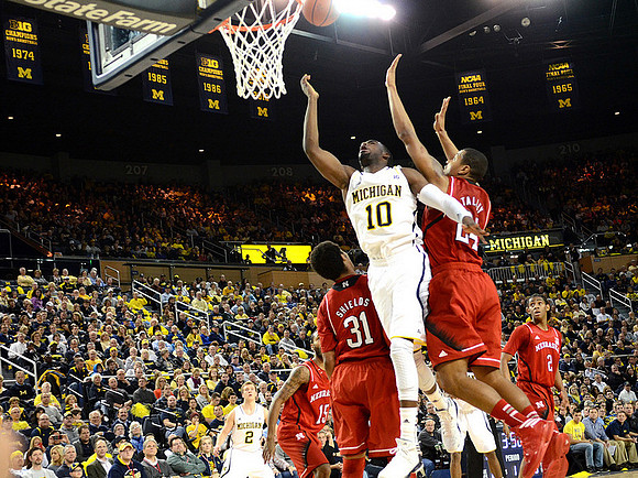 Tim Hardaway Jr. (10) and Spike Albrecht (2)