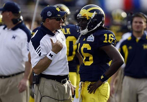 Rich Rodriguez and Denard Robinson (16)