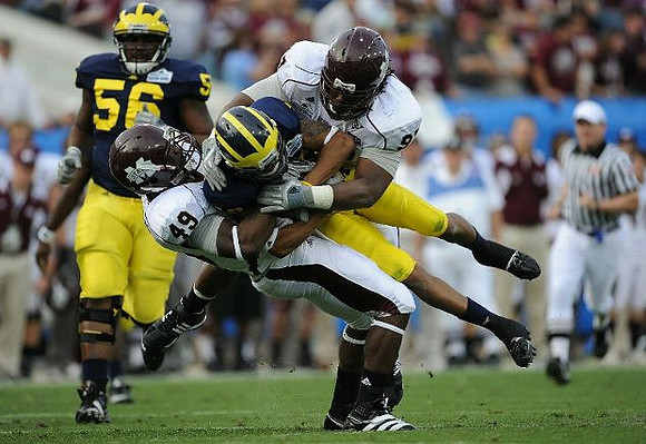 Ricky Barnum (56) and Roy Roundtree (12)