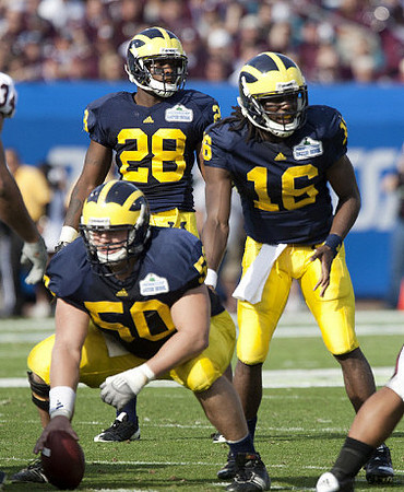 David Molk (50), Fitzgerald Toussaint (28), and Denard Robinson (16)