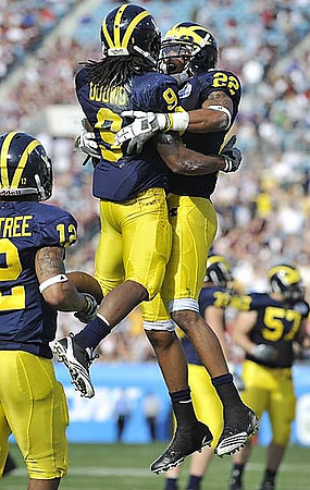 Roy Roundtree (12), Martavious Odoms (9), and Darryl Stonum (22)