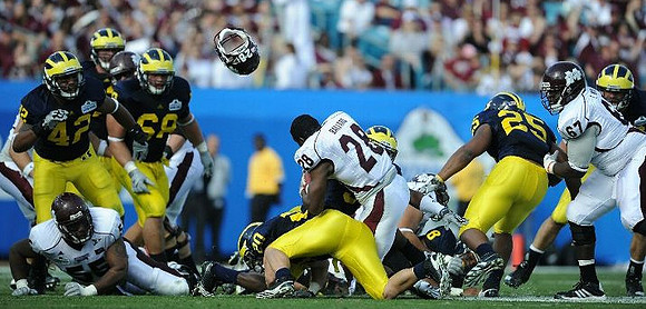 J.B. Fitzgerald (42), Mike Martin (68), Ray Vinopal (20), Jonas Mouton (8), and Kenny Demens (25)
