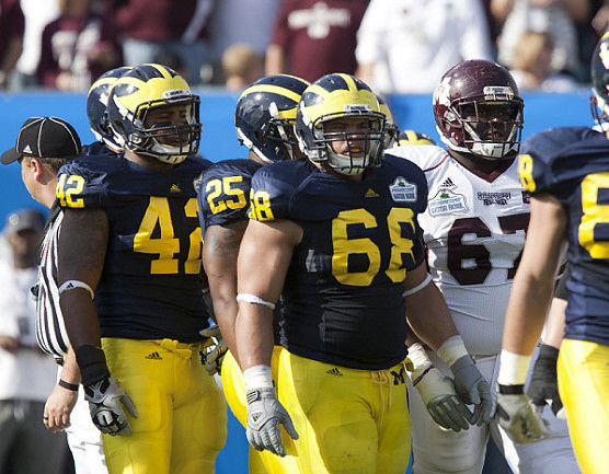J.B. Fitzgerald (42), Kenny Demens (25), Mike Martin (68), and Craig Roh (88)
