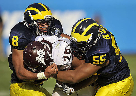Jonas Mouton (8) and Jibreel Black (55)