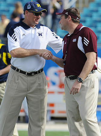Rich Rodriguez and Dan Mullen