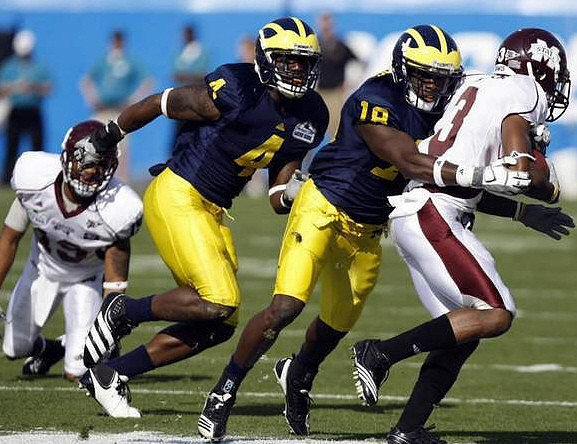 Cameron Gordon (4) and James Rogers (18)