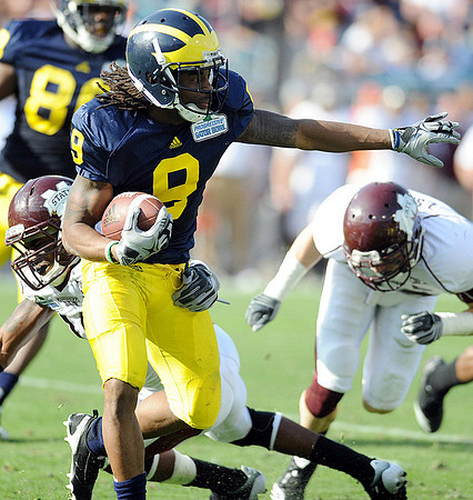 Martavious Odoms (9) and Martell Webb (80)