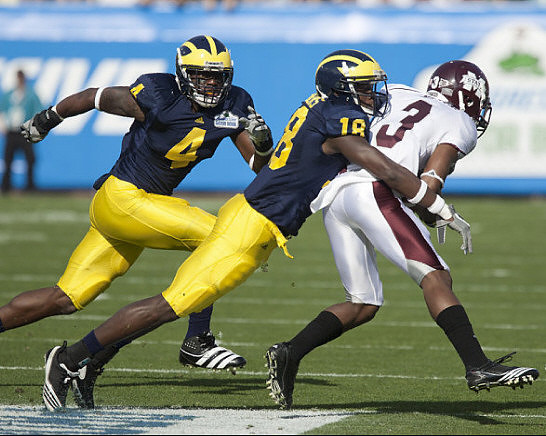 Cameron Gordon (4) and James Rogers (18)