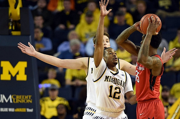 Mark Donnal (34) and Muhammad-Ali Abdur-Rahkman (12)