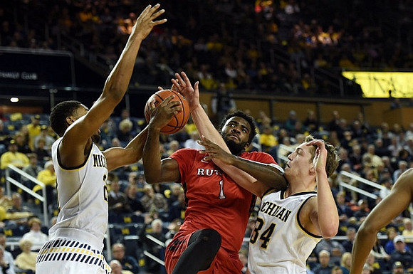 Zak Irvin (21) and Mark Donnal (34)